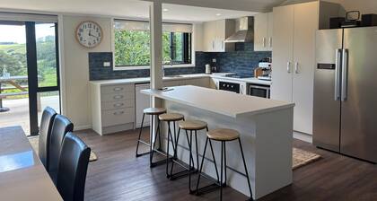 Relax and Unwind in this Farmhouse surrounded by Native bush and farmland