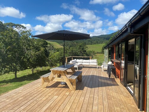 Relax and Unwind in this Farmhouse  surrounded by Native bush and farmland