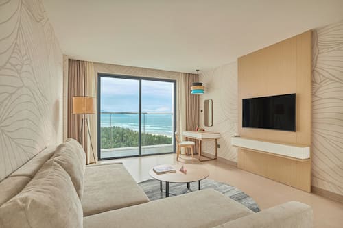 Suite, 1 Bedroom, Sea View | Minibar, in-room safe, desk, laptop workspace