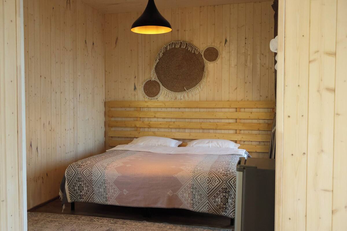 Suite – deluxe, fjellutsikt | Sengetøy av topp kvalitet, skrivebord og skrivebord for bærbar PC