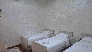 Deluxe Triple Room, Garden View | Spa