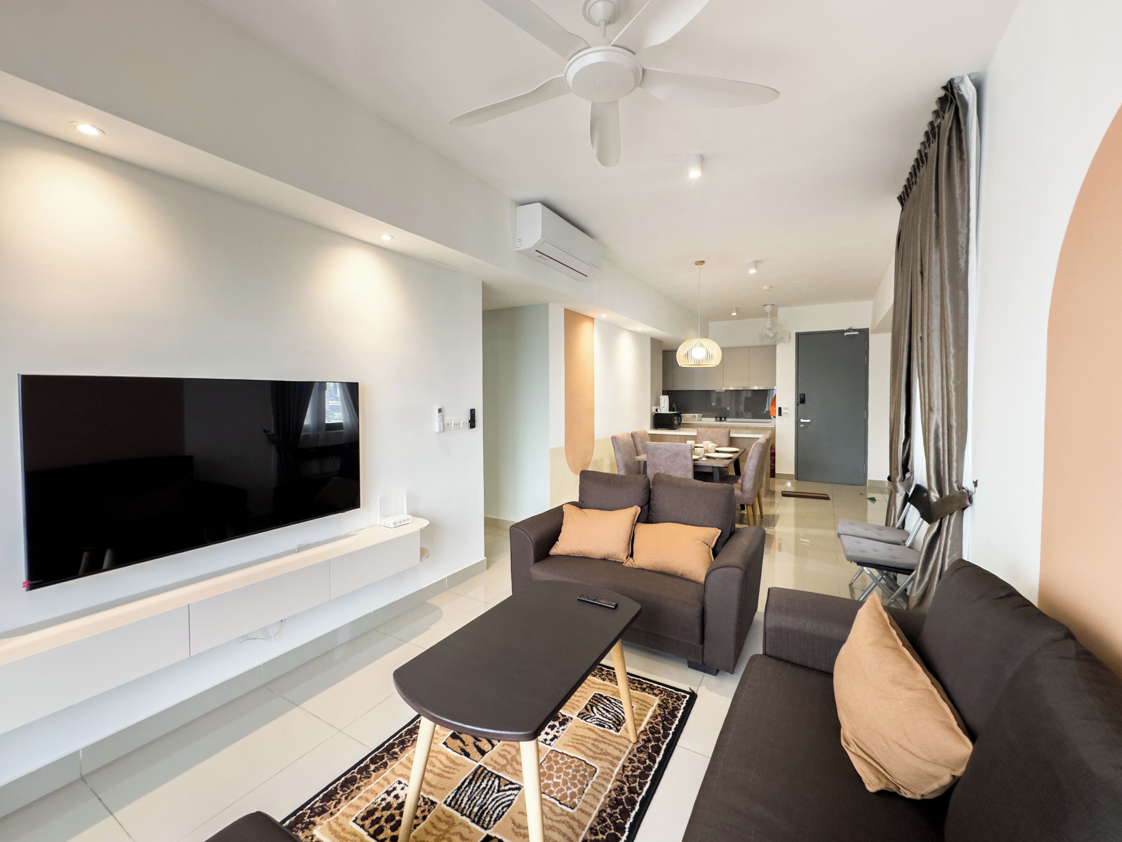 Condo, 4 Bedrooms, Balcony, City View | Living area | 45-inch Smart TV with digital channels