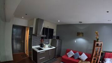 コンフォート ダブルルーム バルコニー シティビュー | リビング エリア