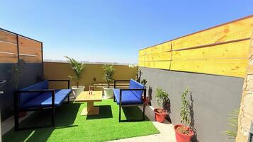 Luxury Double Room, City View | Terrace/patio