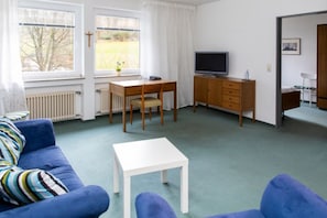 Habitación individual estándar | Área de sala de estar
