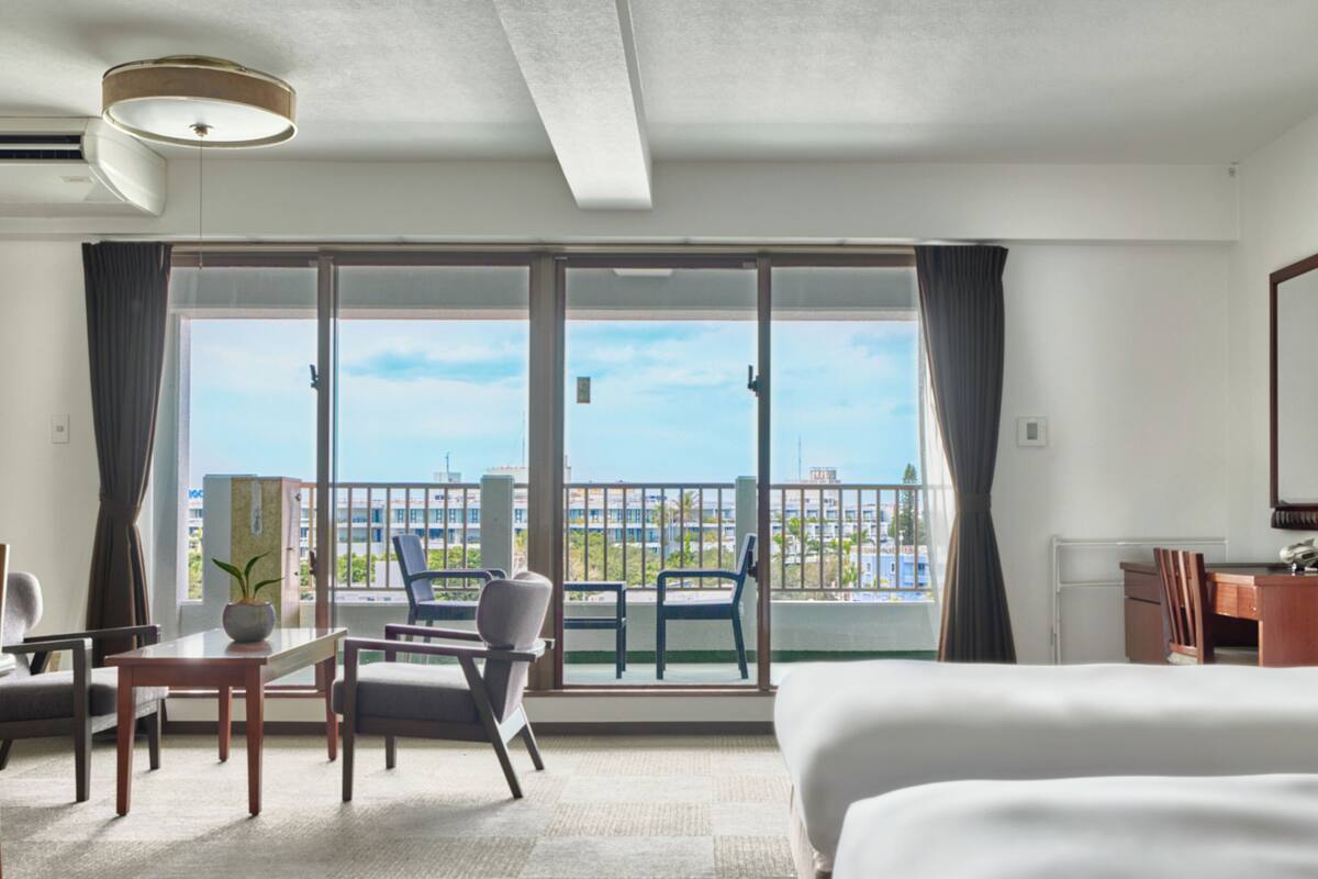 Deluxe Quadruple Room, Balcony, City View