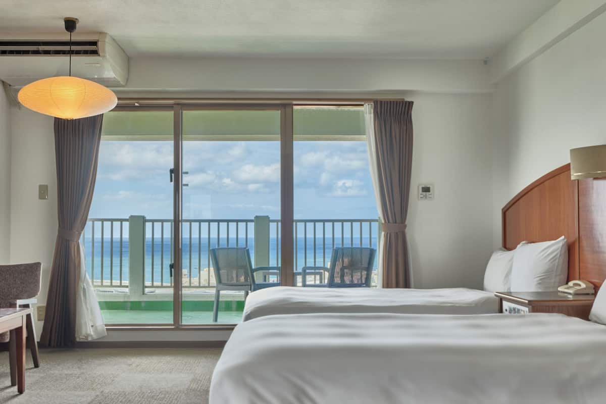 Chambre Confort avec lits jumeaux, balcon, vue sur l’océan | Bureau, accès au Wi-Fi (inclus), literie fournie