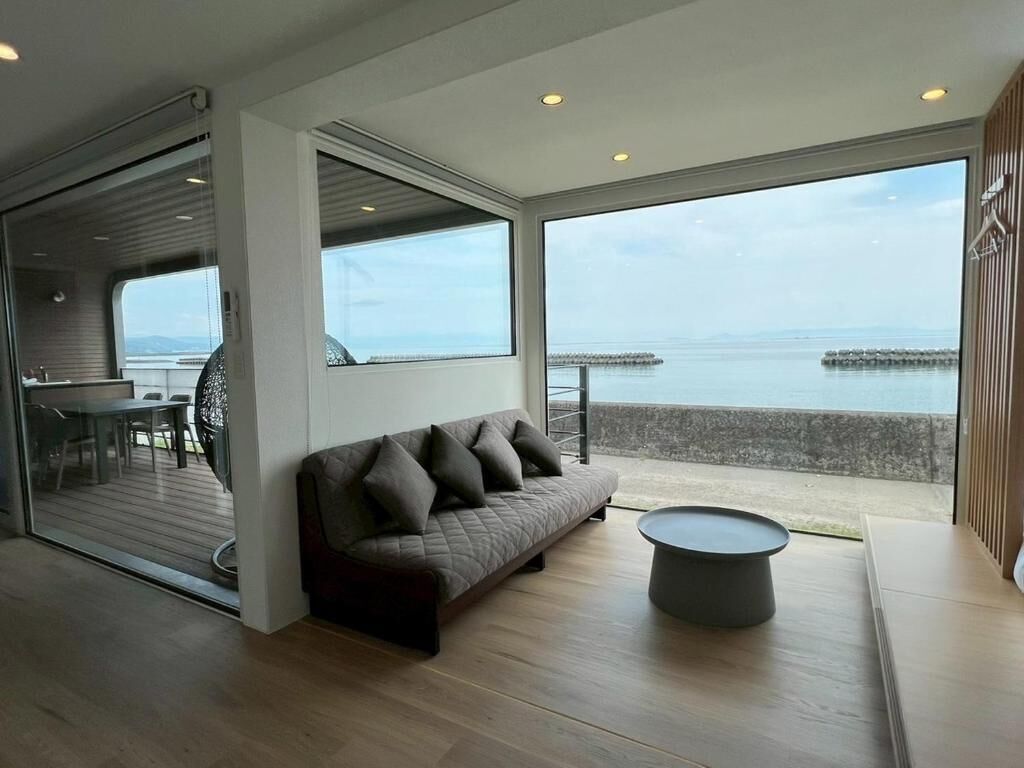 Deluxe Quadruple Room, Non Smoking, Ocean View (N05) | Living area