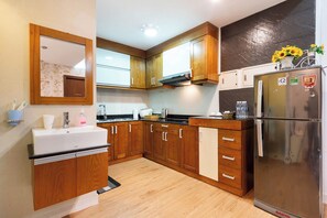Deluxe Apartment, 2 Bedrooms, Balcony, City View | Private kitchen - The ONE Signature Residence (One)