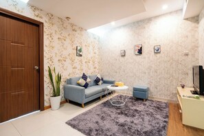 Deluxe Apartment, 2 Bedrooms, Balcony, City View | Living area - The ONE Signature Residence (One)