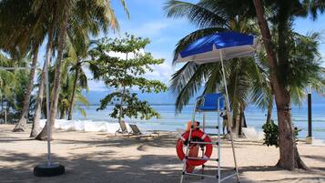 On the beach, white sand