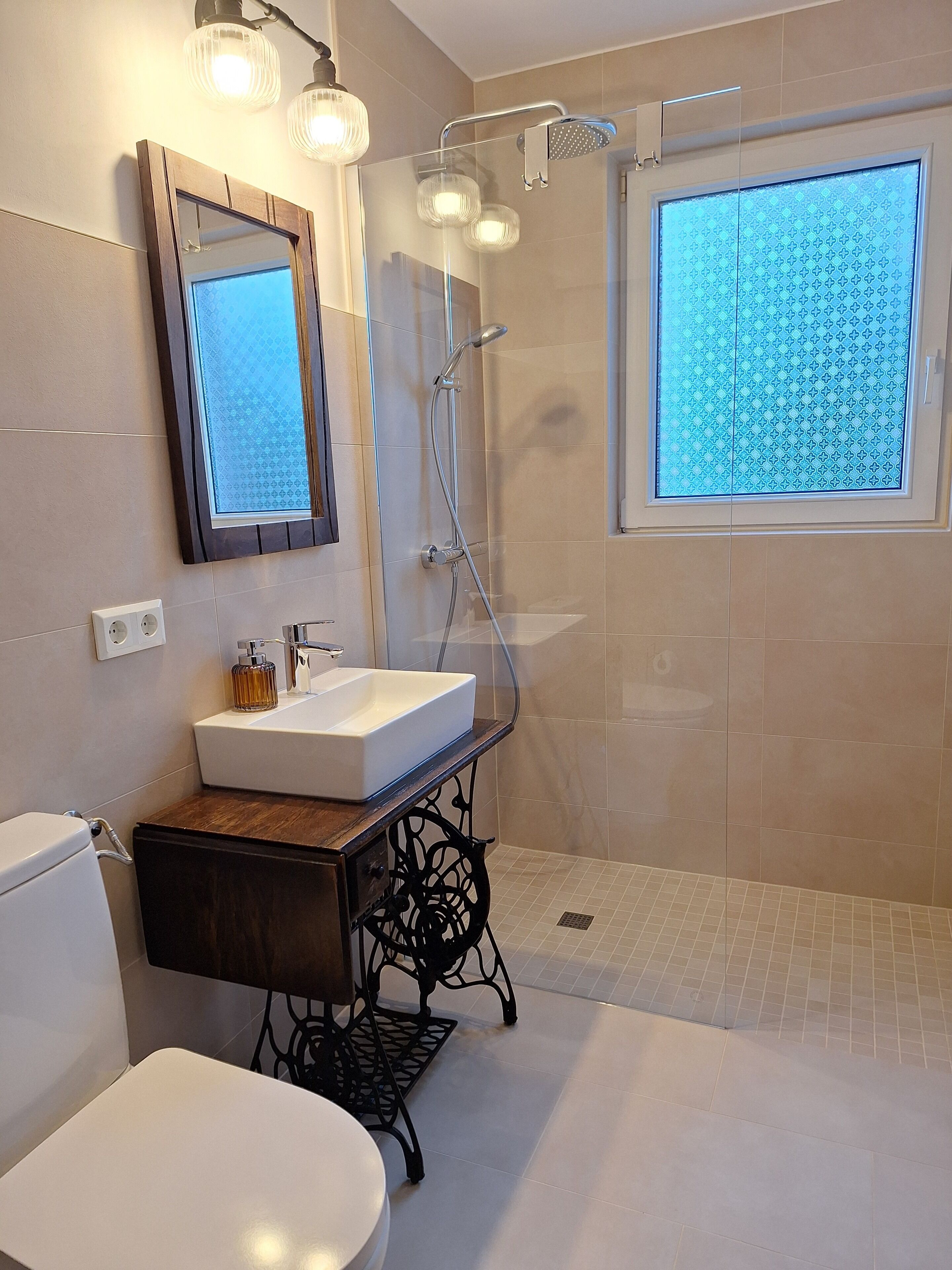 Shower, towels, soap, toilet paper