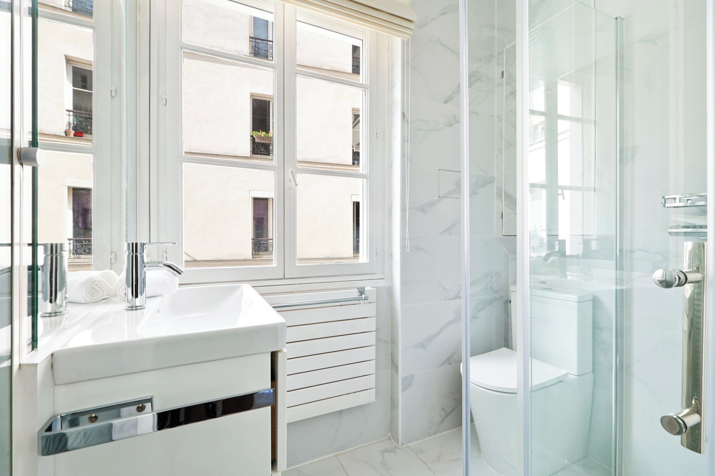 Shower, hair dryer, towels, shampoo