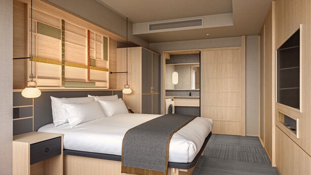 Een moderne hotelkamer met een groot bed, een inbouw kast, een kaptafel met spiegel en een flatscreen televisie.