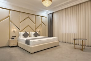 Luxury Suite, City View | In-room safe, desk, laptop workspace, blackout drapes - Porto Bello Hotel  (Tashkent)