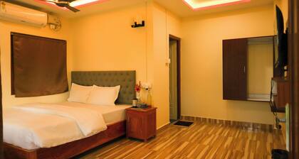 Room in Raindrop Homestay close to dive centers & beaches with Shared kitchen