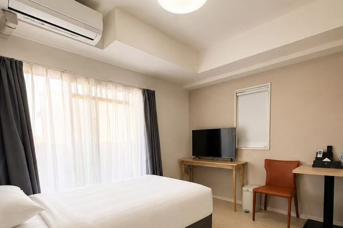 Comfort appartement, 1 eenpersoonsbed, balkon, uitzicht op de stad | Donsdekens, een bureau, gratis wifi