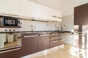 Luxury Apartment, Balcony, Courtyard View | Private kitchen - Terrazze Di Cesy (Brescia)