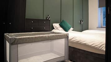 1 bedroom, desk, iron/ironing board, travel cot