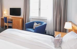 Enkeltrom, balkong, byutsikt | Safe på rommet og wi-fi (inkludert)