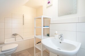 Hair dryer, towels, soap, shampoo