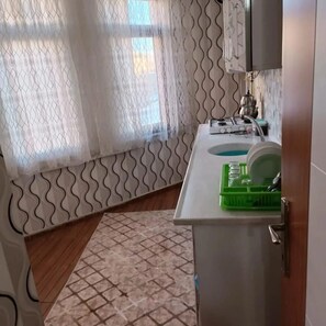 Fridge, stovetop, cookware/dishes/utensils