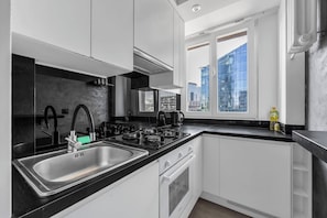 Private kitchen - 11th Floor Center Apartment - 57m2, Two Bedrooms (Warszawa)