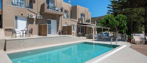 Outdoor pool, pool umbrellas, pool loungers