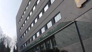A modern hotel building with a prominent 'HOTEL' sign on the facade. - HOTEL CAPITAL (Rovigo)