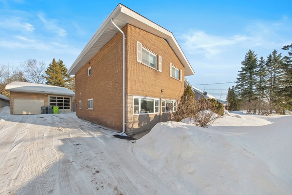 This fully renovated retreat is part of a quiet triplex.
