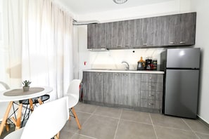 Fridge, coffee/tea maker, toaster, cookware/dishes/utensils