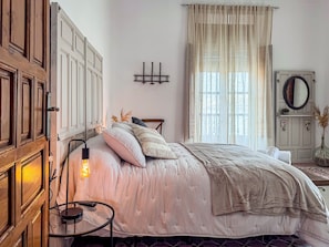 Departamento superior | Tabla de planchar con plancha, wifi gratis y ropa de cama 