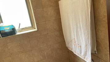 Eco-friendly toiletries, hair dryer, towels, soap