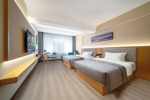 Premium bedding, memory foam beds, blackout drapes, free WiFi