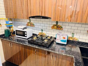 Superior Studio, Patio | Private kitchen - Fortune Home Service Apartment 1RK E-30 (New Delhi)