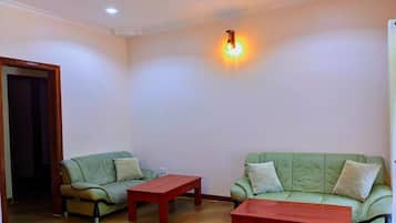 Comfort Suite, Balcony | Living area