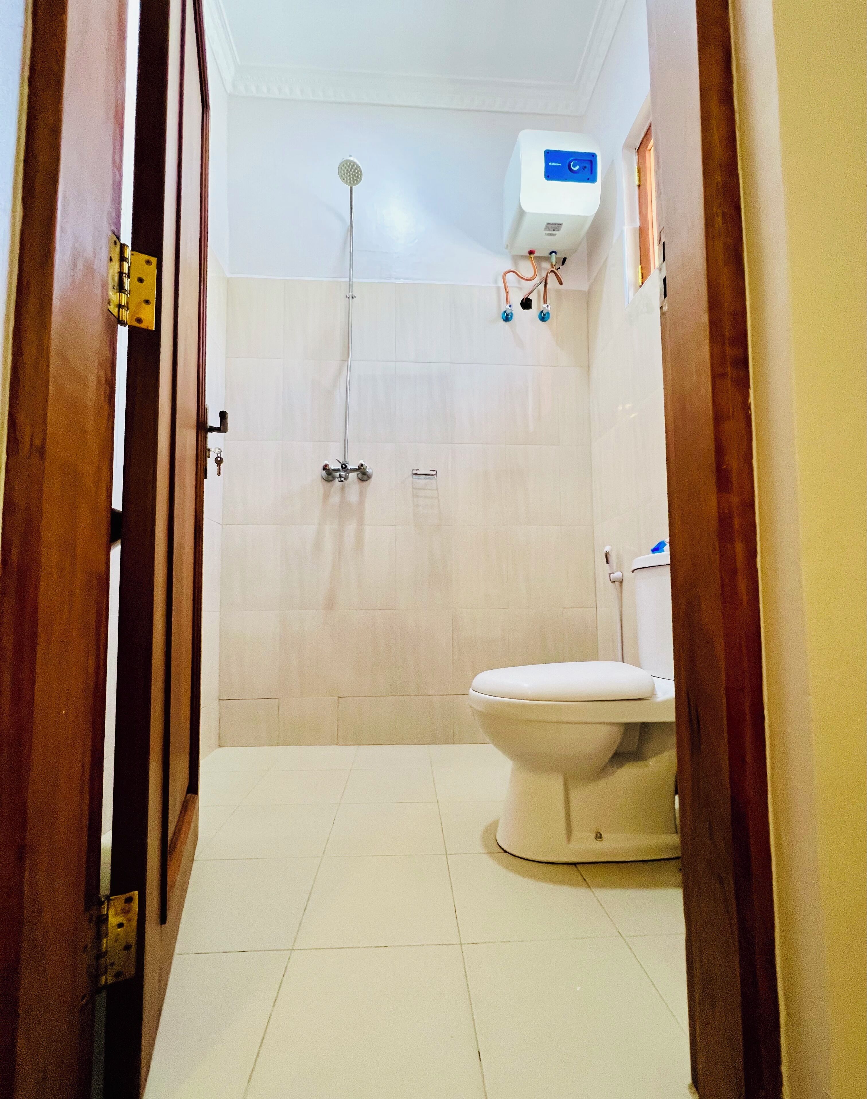 Shower, towels, soap, toilet paper