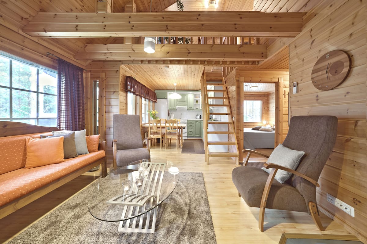 Appartement, 3 chambres, sauna (Kreivi) | Aire de séjour | Téléviseur à écran plat de 50 po avec télévision par cùble, foyer
