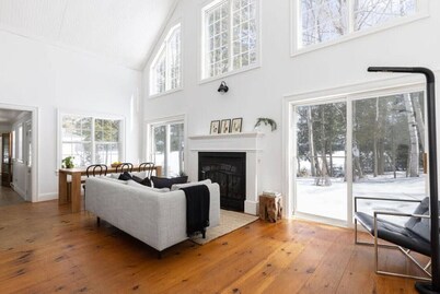 Designer Waterfront Retreat l Dock Kayaks Firepit