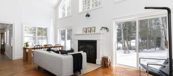 Designer Waterfront Retreat l Dock Kayaks Firepit