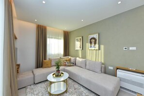 Premium Apartment, 2 Bedrooms, Terrace, Pool View | Living area | 100-cm Smart TV with satellite channels - Luxury Aparthotel Zadar (Zadar)