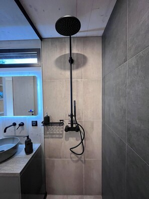 Shower, towels, soap, toilet paper