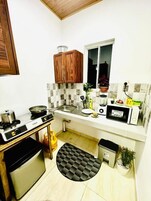 Quarto casal luxo, vista para a cidade | Cozinha privada