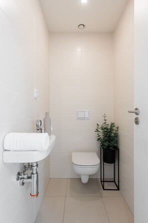 Hair dryer, towels, shampoo, toilet paper - Stylish 2BDR Apartment with Free Parking & Terrace by EasyBNB Premium (Prague)