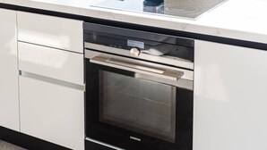 A kitchen with a built-in oven and a microwave. - Villa Amma Valamar Private Pool Jacuzzi (Ishëm)