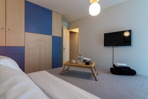 2 dormitorios, tabla de planchar con plancha, wifi y ropa de cama