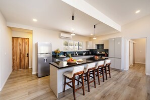 Fridge, microwave, oven, stovetop - Casa Perla 3-bedroom home located in the peaceful Tierra Pacifica community. (Playa Junquillal)