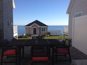 Outdoor dining - Ocean View Oasis - 3BR/3BA w/ Spacious Deck & Starry Night Dining (York)