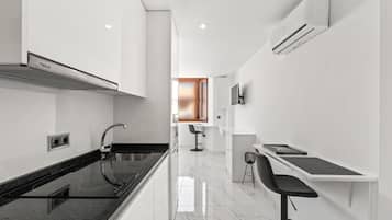 Fridge, microwave, stovetop, cookware/dishes/utensils