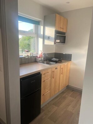 Familiekamer, uitzicht op tuin, op benedenverdieping | Privékeuken